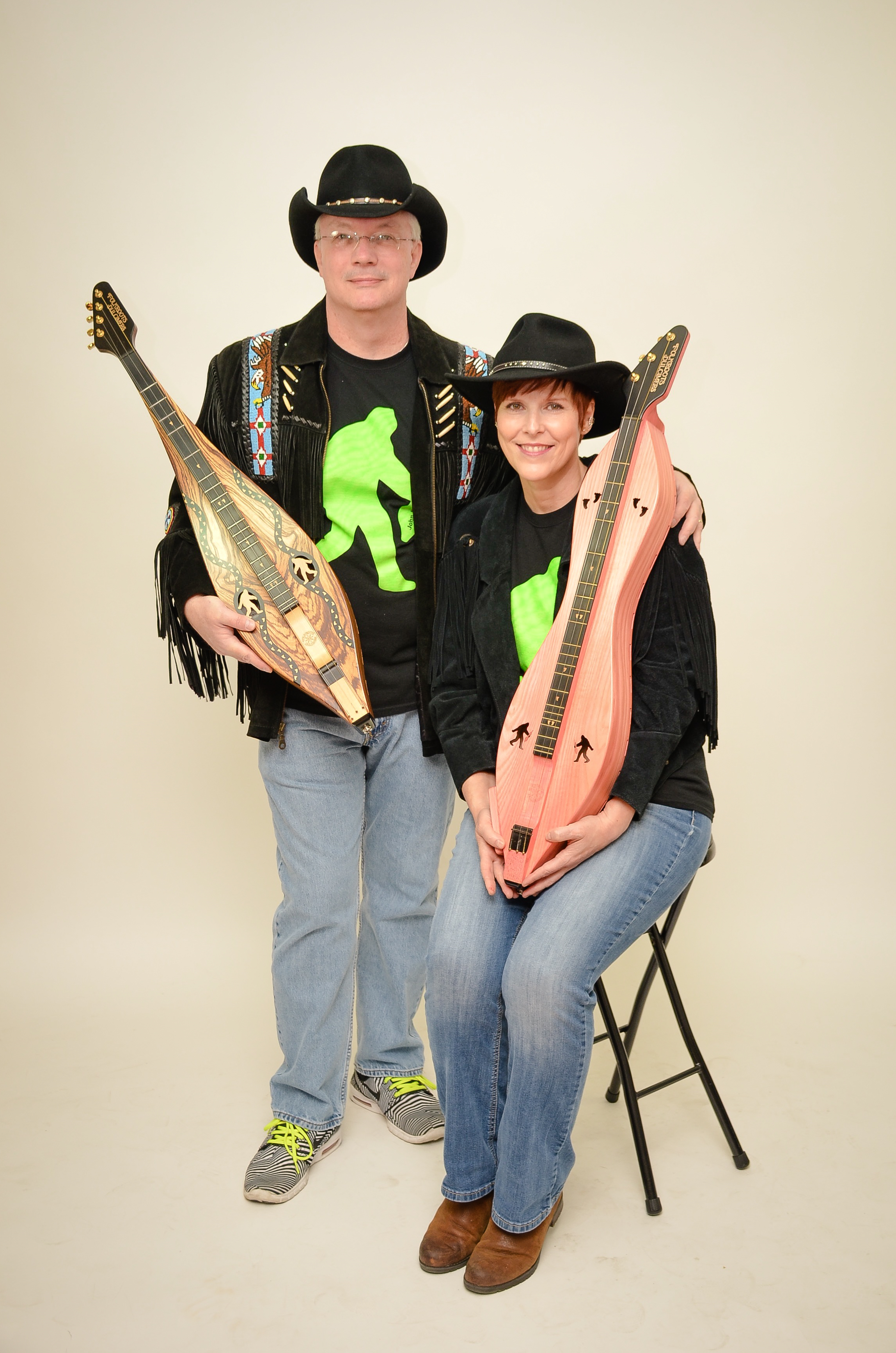John and Karen Keane with their custom-made Big Foot themed Folkcraft dulcimers.